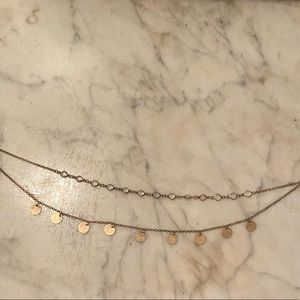 Layered gold colored necklace